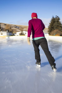 A woman ice skating in phillipsburg, montana