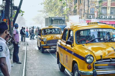 Vehicles on street in city