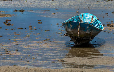 Wooden boat fisherman on blue sea, lifestyles local fisherman in chonburi