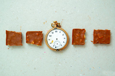 Close-up of clock on wall