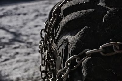 Close-up of tire on beach