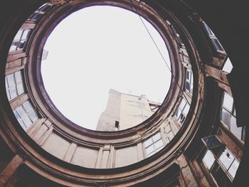 Low angle view of skylight in old building