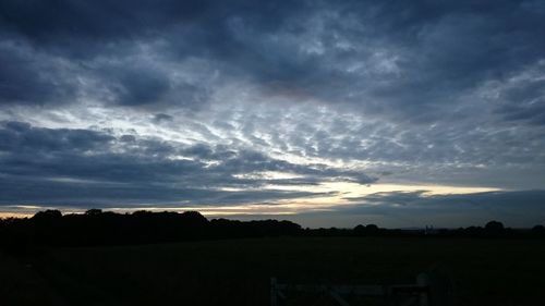 Scenic view of dramatic sky during sunset