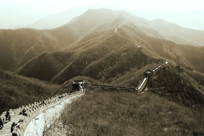 Scenic view of road amidst mountains