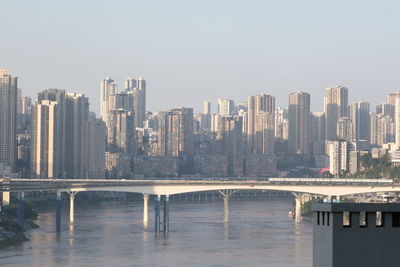 Bridge over river against clear sky