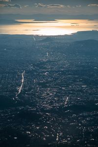 Aerial view of city at sunset