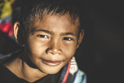 Close-up portrait of smiling boy