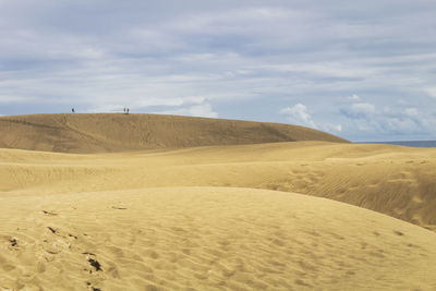 Scenic view of desert against sky