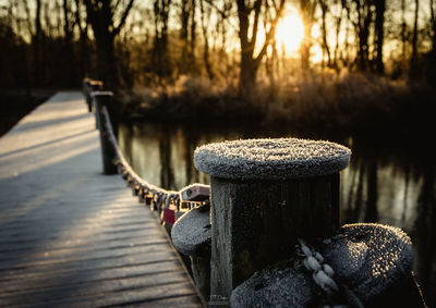 Close-up of metallic structure on footpath