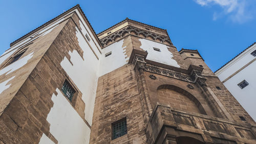 Low angle view of historic church against sky