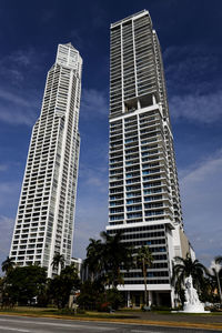 Low angle view of modern buildings against sky
