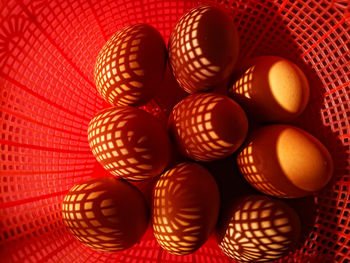 Close-up of brown eggs in basket