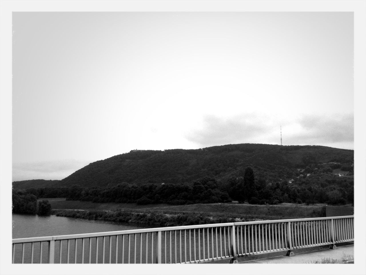 mountain, transfer print, railing, water, tranquil scene, tranquility, scenics, mountain range, auto post production filter, beauty in nature, sky, nature, lake, clear sky, sea, copy space, pier, idyllic, fence, non-urban scene