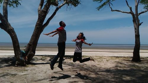 People playing on beach