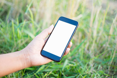 Close-up of hand holding smart phone