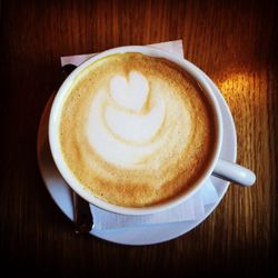 Close-up of cappuccino on table