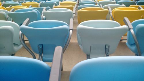 Empty chairs in stadium