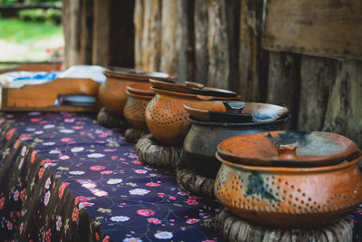 Close-up of local ceramic food pots