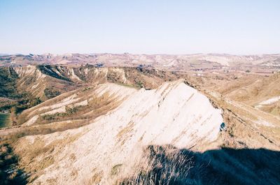 High angle view of mountains against clear sky