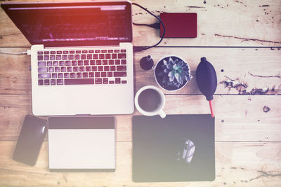 Directly above shot of coffee cup on table