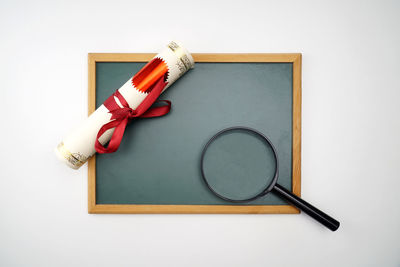 High angle view of pen on table against white background