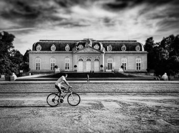 Person riding bicycle on road