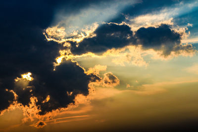 Low angle view of clouds in sky during sunset