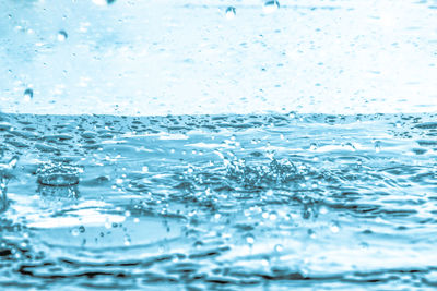 Close-up of water splashing in sea