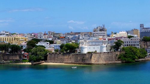 High angle view of walled city by sea