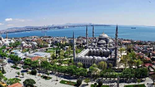 High angle view of sultan ahmed mosque against sky during sunny day