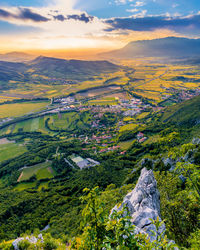 Aerial view of landscape against sky during sunset