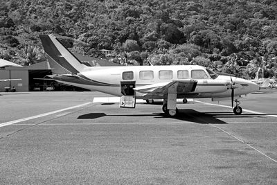 Rear view of man on airport runway