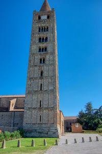 Low angle view of historical building against blue sky