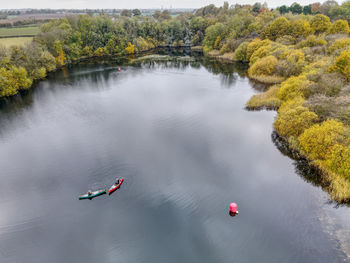 High angle view of lake against trees