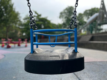 Close-up of swing at playground