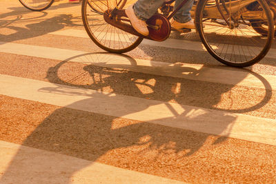 The shadow of a cyclist riding a bike in shanghai