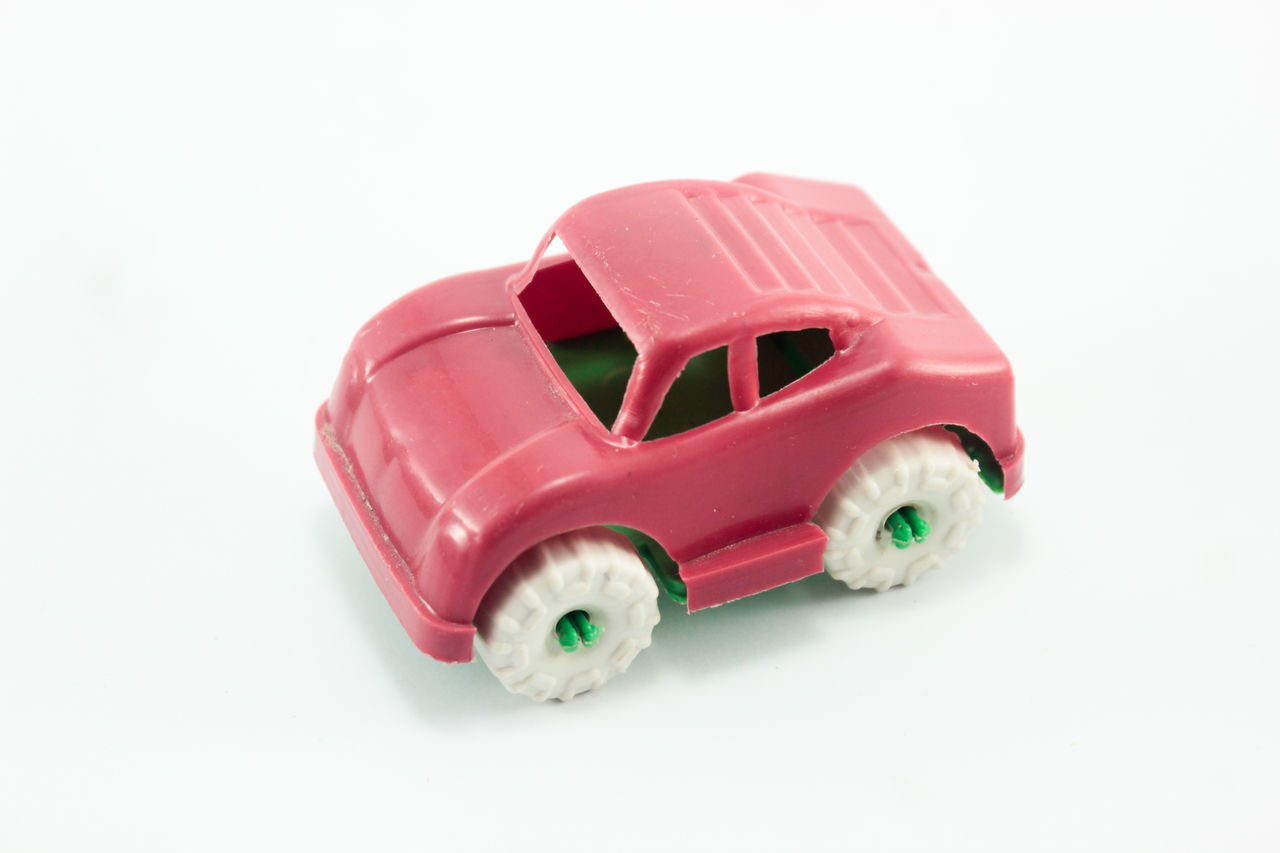 toy, car, motor vehicle, white background, vehicle, cut out, model car, wheel, scale model, toy car, mode of transportation, childhood, transportation, studio shot, land vehicle, pink, red, indoors, business