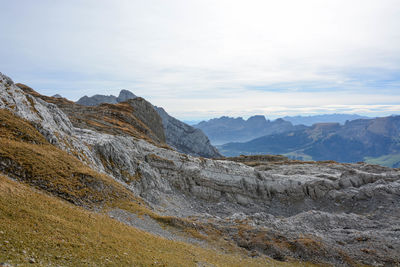 Scenic view of rocky mountains against sky