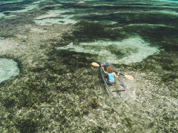 High angle view of man surfing in sea