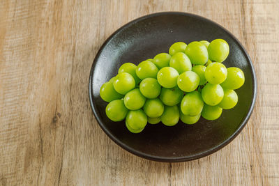 High angle view of fruits in bowl on table