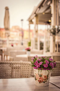 Flower vase on table