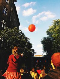 Low angle view of balloons against clear sky