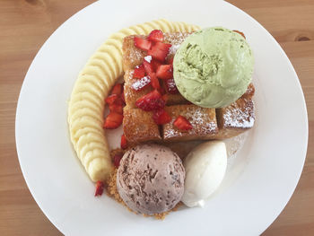 High angle view of ice cream in plate on table