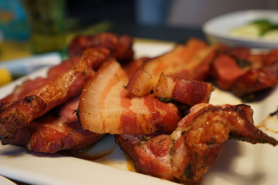 Close-up of meat served in plate on table