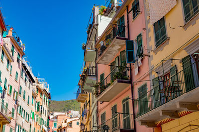 Low angle view of residential buildings against clear sky