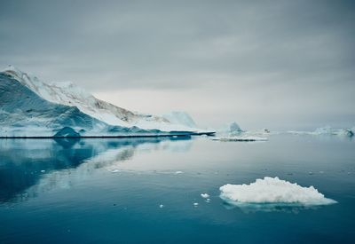 Scenic view of frozen lake against sky