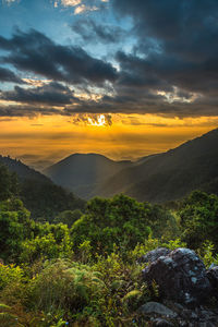 Scenic view of mountains at sunset