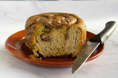 Portuguese easter cake called folar algarvio de olhao with knife