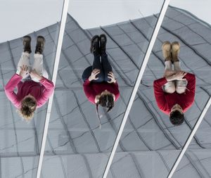 High angle view of people standing on tiled floor