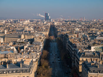 High angle view of city buildings against sky